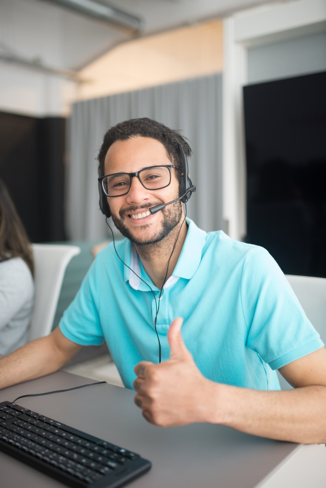 A Man Working in the Call Center